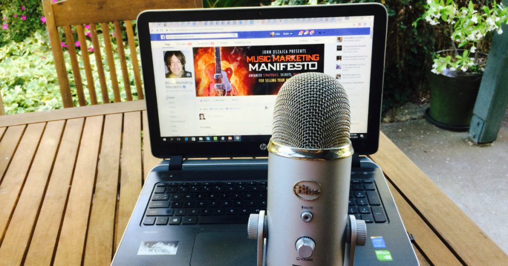 Music Marketing Manifesto on computer screen with microphone