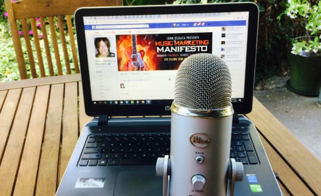 Music Marketing Manifesto on computer screen with microphone